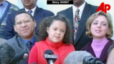 2001: Boesak (left), alongside one of his daughters and his wife, Elna, speaks at a press conference following his release from a South African prison in 2001. (Photo from Associated Press)