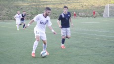 Sophomore Mike Kozieliek goes to pass the ball as two Georgetown defenders look on. Collegian file photo