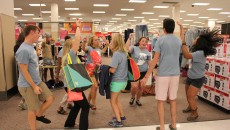 A group of dancing student orientation guides keeps the energy up along with the DJ.  Photo by Amy Street