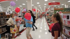 Students attempt to juggle three balloons at a time. Photo by Amy Street