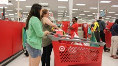 Deborah Ebbinghaus (left) buys groceries at Target. Photo by Amy Street.