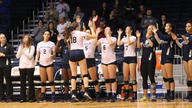 Butler senior Mary Striedl celebrates with teammates on the bench. (Photo by Jimmy Lafakis)