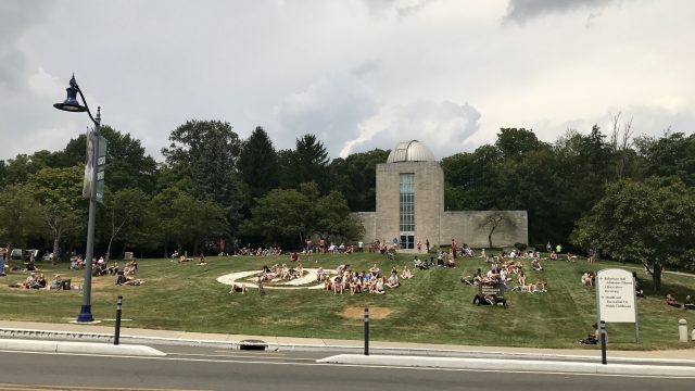 Butler University views solar eclipse through intermittent clouds