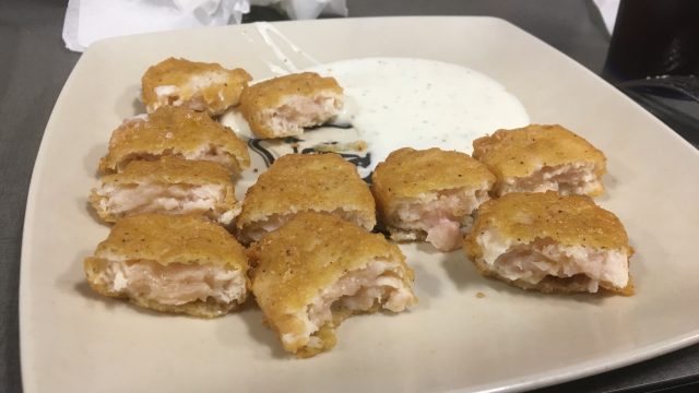 Butler students consume raw chicken on Atherton nugget night